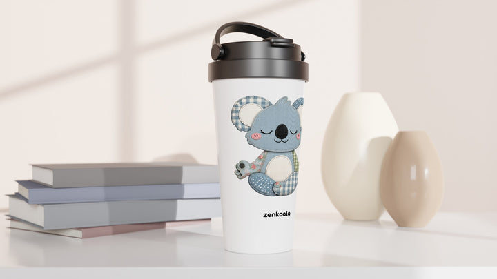 Faux Patchwork Meditating Koala travel mug beside books and vases, Zen Koala Australia