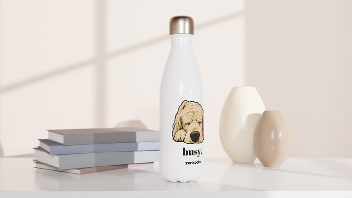 Busy water bottle beside books and vases, Zen Koala Australia