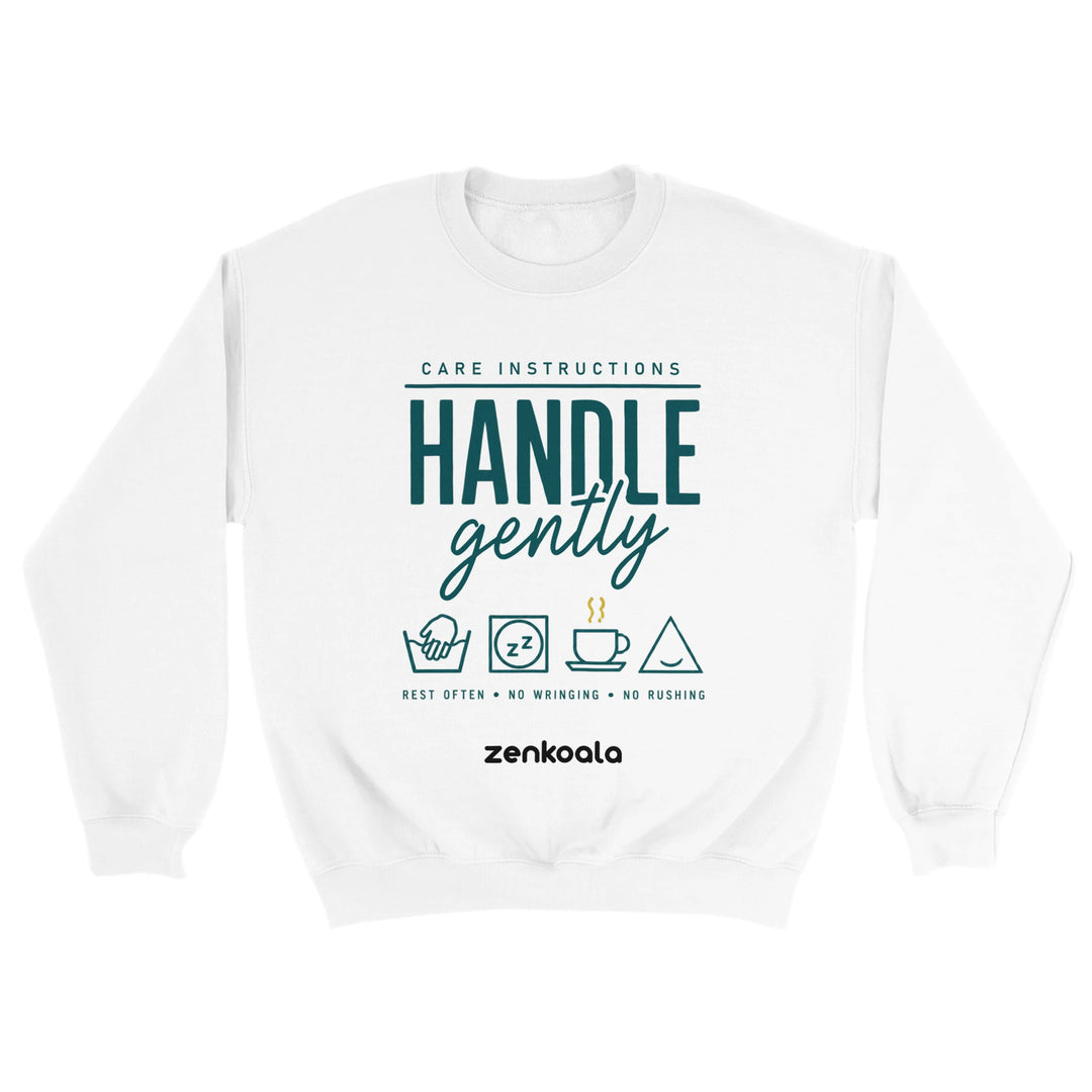 Handle Gently Care Instructions feel-good sweatshirt in White — care-label icons for rest, no wringing, no rushing, Zen Koala Australia